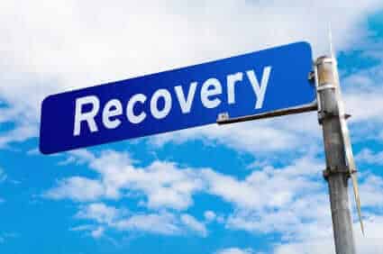 Recovery sign directing you to beat addiction