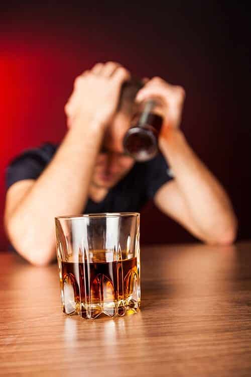 A man struggles with an alcohol use disorder
