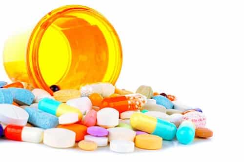 An emptied bottle of medication illustrates prescription drug abuse statistics