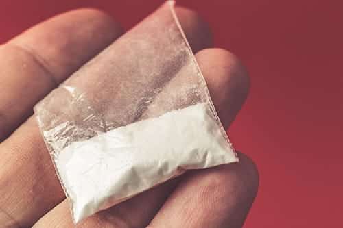 a bag of white power, is it crack vs coke