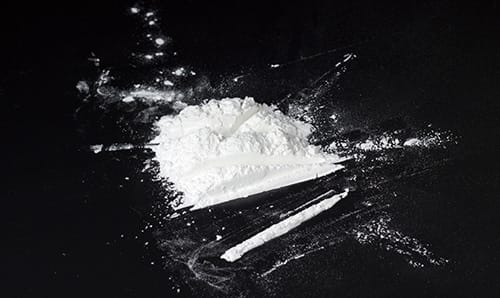 coke drug lined up on a table