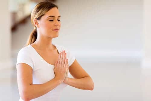 woman experiencing the benefits of meditation