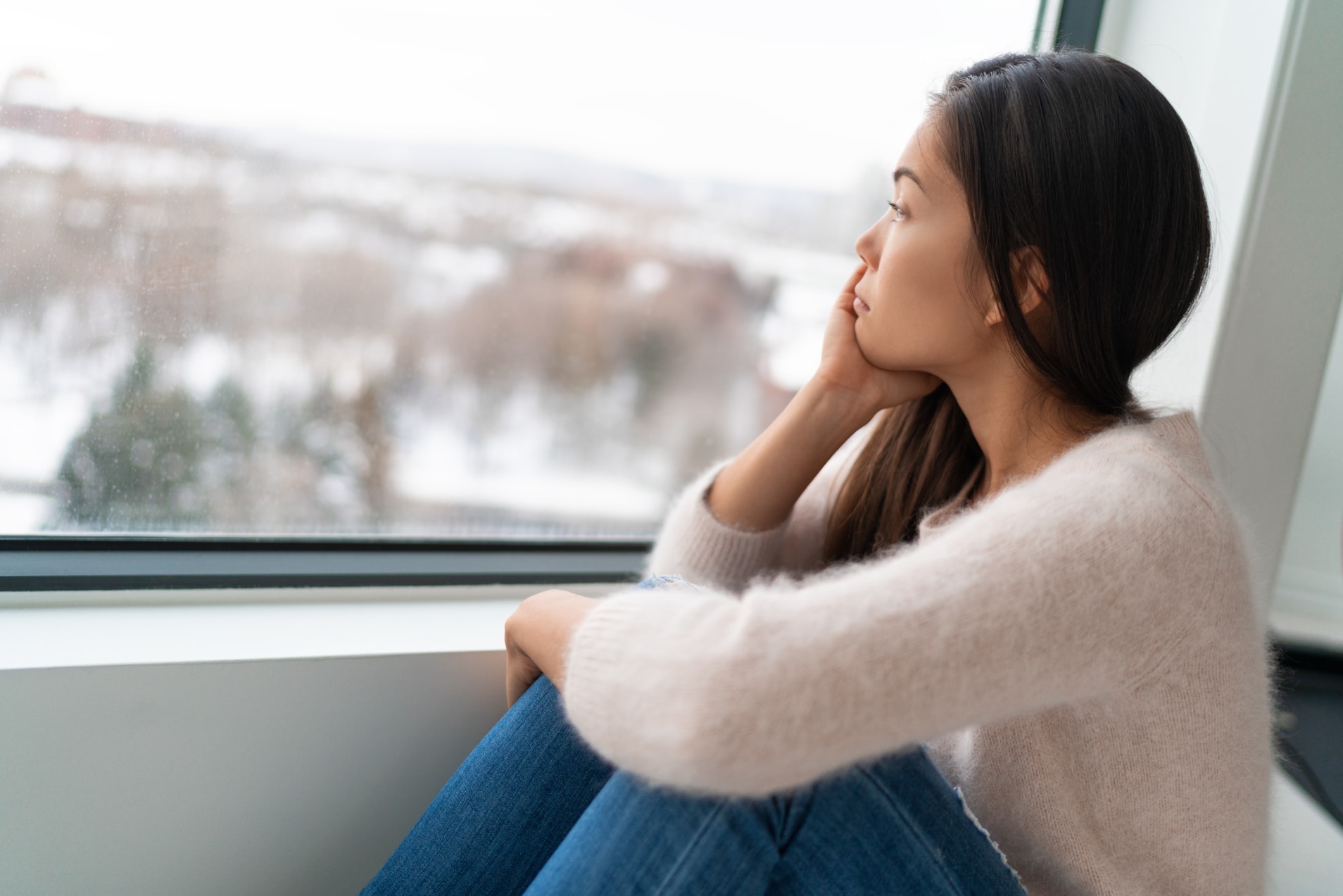 STR Woman Depressed looking out window